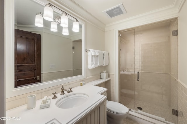 1 Willow Bridge Rd Unit 36, Vail, CO 81657 - bathroom featuring toilet, vanity, a shower stall, and ornamental molding