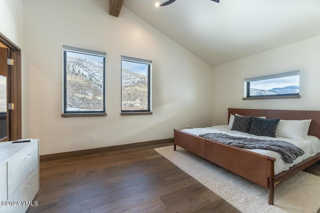 bedroom with dark hardwood / wood-style floors and vaulted ceiling with beams