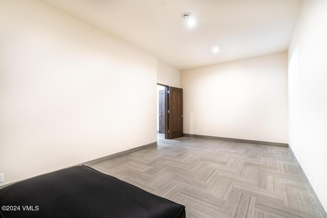 empty room featuring light parquet flooring