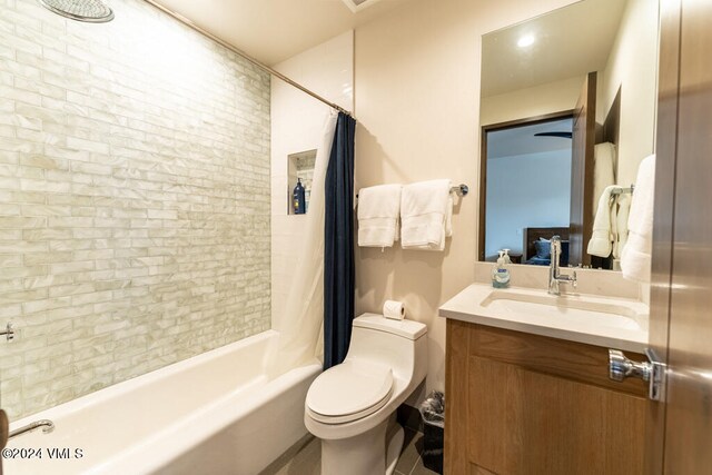 full bathroom with vanity, toilet, and shower / bath combo