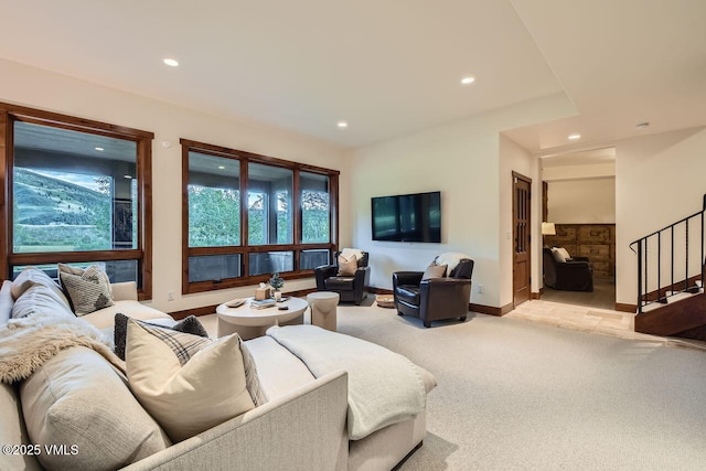 44 Conestoga Cir, Edwards, CO 81632 - living room with recessed lighting, light carpet, and stairs