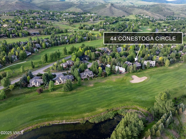 44 Conestoga Cir, Edwards, CO 81632 - aerial view of residential area with a mountain backdrop and property parcel outlined