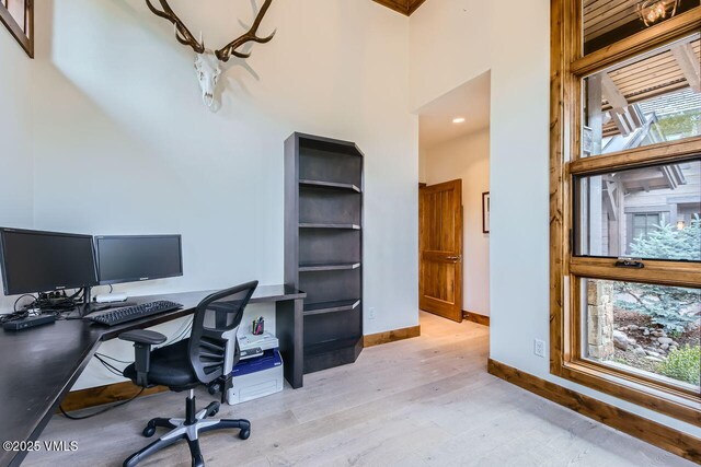 44 Conestoga Cir, Edwards, CO 81632 - office featuring light wood-type flooring and a high ceiling