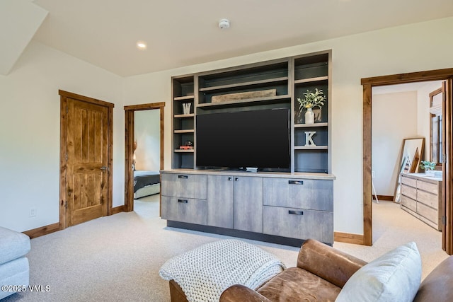 44 Conestoga Cir, Edwards, CO 81632 - living area featuring light colored carpet and built in features