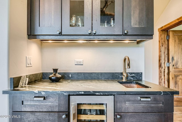 44 Conestoga Cir, Edwards, CO 81632 - indoor wet bar featuring wine cooler