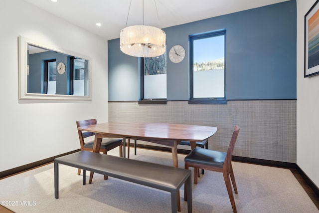 dining space featuring recessed lighting and baseboards