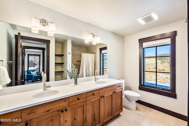 481 Hunters View Ln, Eagle, CO 81631 - bathroom featuring vanity, curtained shower, and toilet