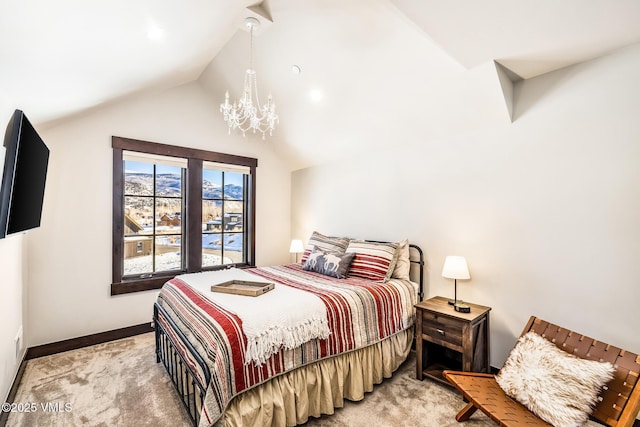 481 Hunters View Ln, Eagle, CO 81631 - carpeted bedroom with lofted ceiling and an inviting chandelier