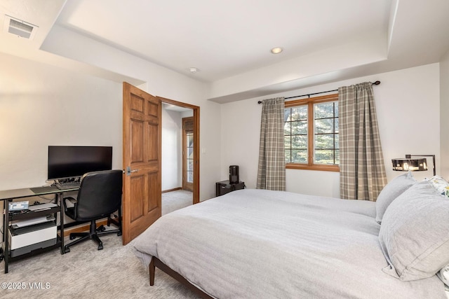 107 Lions Ln, Minturn, CO 81645 - bedroom with a raised ceiling, light carpet, and visible vents