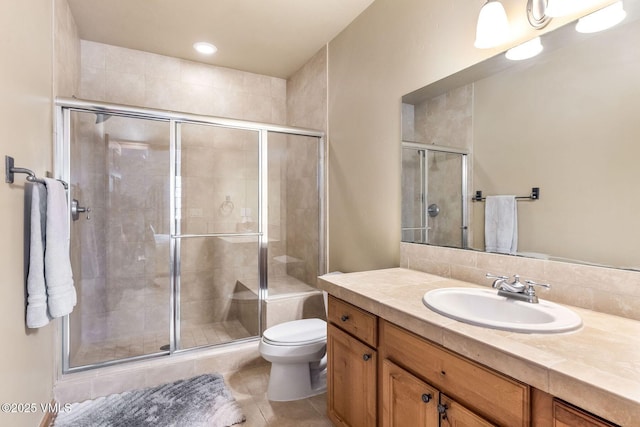 107 Lions Ln, Minturn, CO 81645 - full bathroom with toilet, a shower stall, tile patterned flooring, and vanity