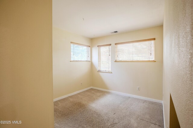 600 Nottingham Rd Unit 8, Avon, CO 81620 - carpeted empty room with baseboards