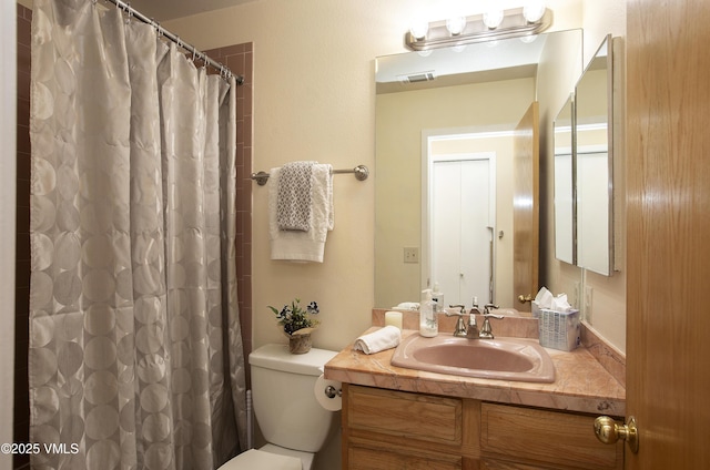 600 Nottingham Rd Unit 8, Avon, CO 81620 - bathroom with vanity, toilet, and a shower with shower curtain