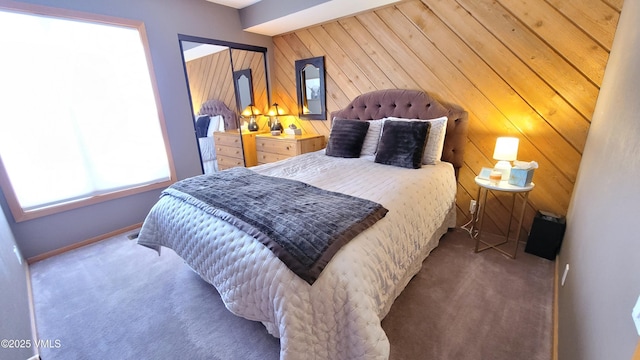 000149 Willis Pl Unit 140, Beaver Creek, CO 81620 - bedroom featuring carpet, baseboards, and wooden walls