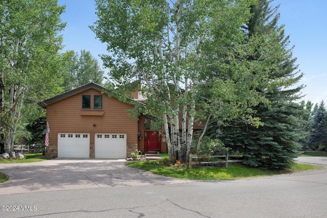 view of front of property with a garage