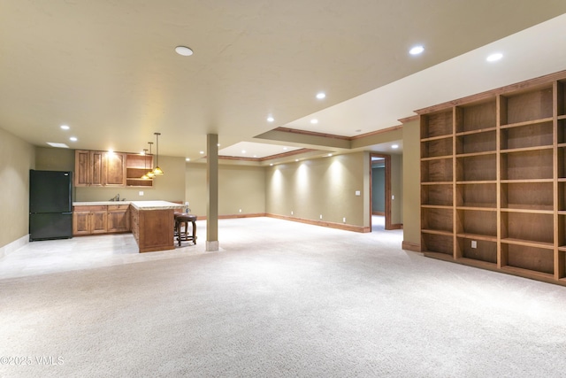 88 E Double Hitch, Eagle, CO 81631 - unfurnished living room featuring light carpet, bar with sink, baseboards, recessed lighting, and crown molding