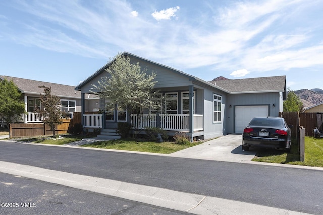 44 Salmon Loop, Gypsum, CO 81637 - view of front of house with covered porch, a garage, and concrete driveway