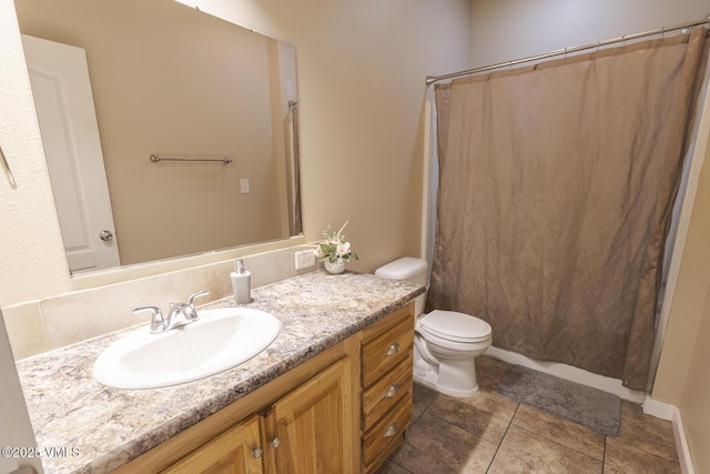 44 Salmon Loop, Gypsum, CO 81637 - full bath featuring vanity, toilet, and tile patterned flooring