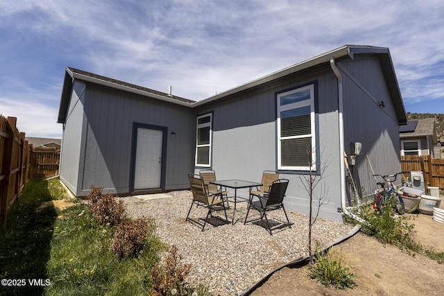 44 Salmon Loop, Gypsum, CO 81637 - rear view of property with a fenced backyard and a patio