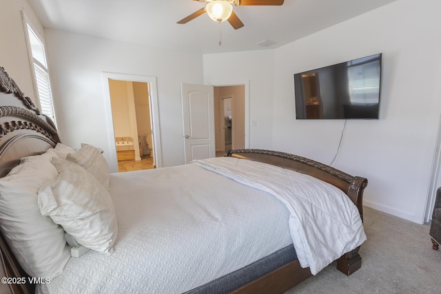 44 Salmon Loop, Gypsum, CO 81637 - carpeted bedroom with a ceiling fan and connected bathroom