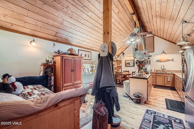 425 Howard St, Eagle, CO 81631 - living area with wood ceiling, light wood finished floors, and ceiling fan