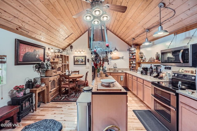 425 Howard St, Eagle, CO 81631 - kitchen with appliances with stainless steel finishes, wooden ceiling, lofted ceiling, a sink, and light wood-style flooring