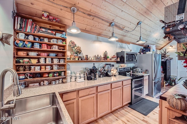 425 Howard St, Eagle, CO 81631 - kitchen featuring stainless steel appliances, open shelves, a sink, wood ceiling, and light wood-style floors