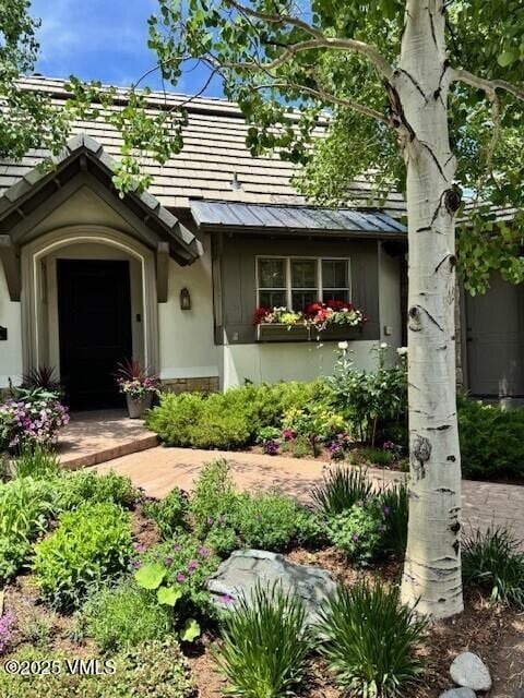 446 Kensington Dr, Edwards, CO 81632 - doorway to property with a standing seam roof and a metal roof