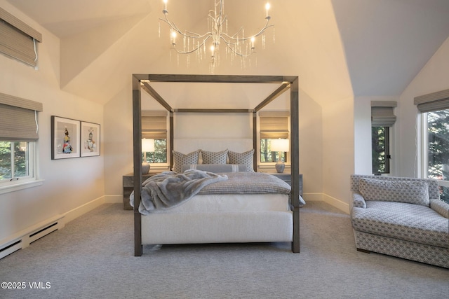 446 Kensington Dr, Edwards, CO 81632 - bedroom featuring carpet floors, a chandelier, multiple windows, and vaulted ceiling