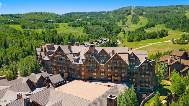 130 Daybreak Rdg Unit Hs640, Avon, CO 81620 - aerial view of residential area with a heavily wooded area