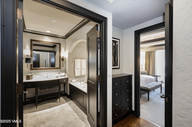 130 Daybreak Rdg Unit Hs640, Avon, CO 81620 - full bathroom featuring a garden tub, vanity, and connected bathroom