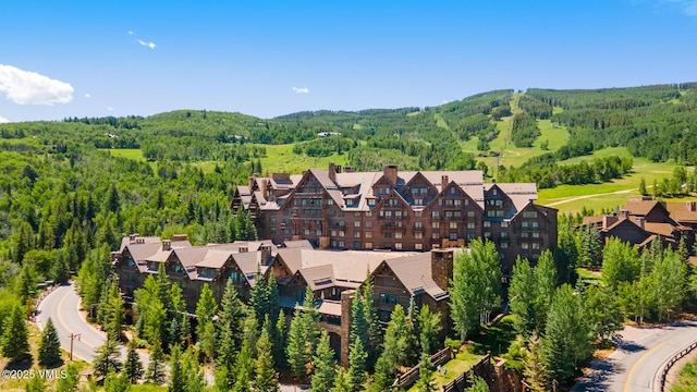 130 Daybreak Rdg Unit Hs640, Avon, CO 81620 - aerial view of a forest and a mountainous background