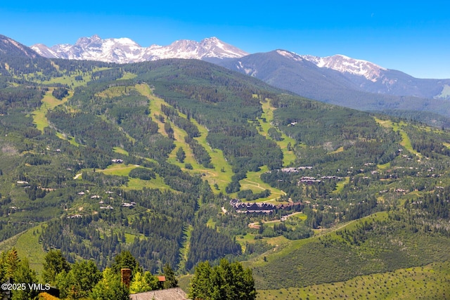 130 Daybreak Rdg Unit Hs640, Avon, CO 81620 - mountain view with a heavily wooded area
