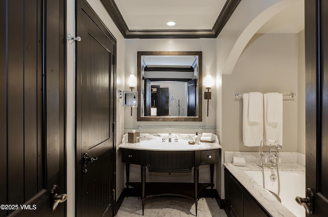 130 Daybreak Rdg Unit Hs640, Avon, CO 81620 - bathroom featuring marble finish flooring, vanity, a tub to relax in, ornamental molding, and recessed lighting