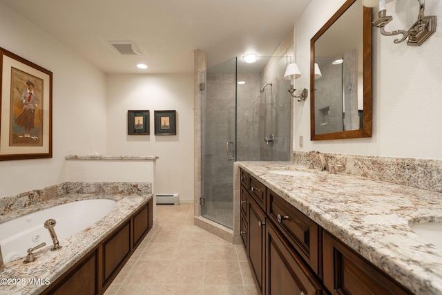 bathroom featuring baseboard heating, vanity, shower with separate bathtub, and tile patterned flooring