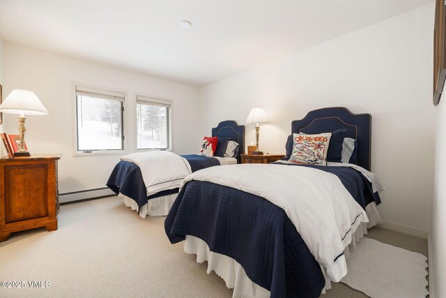 bedroom featuring carpet floors and baseboard heating