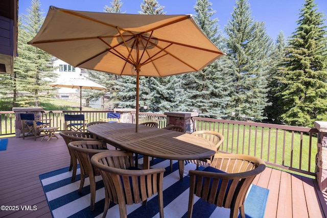 51 Hillside Ct W, Edwards, CO 81632 - wooden deck with outdoor dining area and a lawn