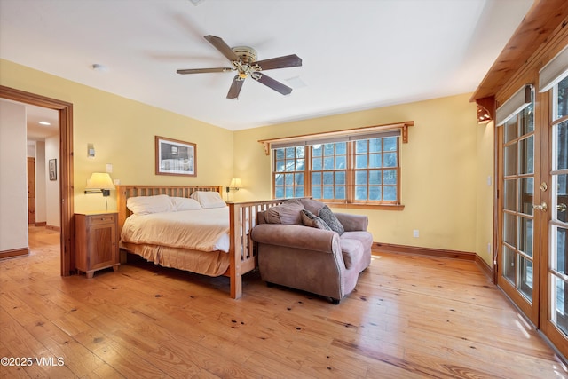 bedroom with baseboards, ceiling fan, light wood-style flooring, and visible vents