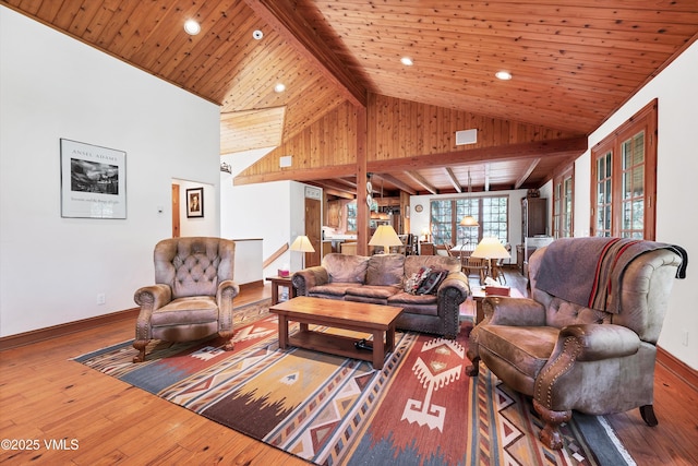 living room with french doors, hardwood / wood-style flooring, baseboards, lofted ceiling with beams, and recessed lighting