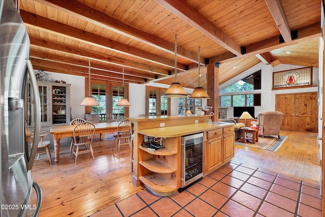 kitchen featuring open shelves, wine cooler, beam ceiling, wooden ceiling, and stainless steel fridge with ice dispenser