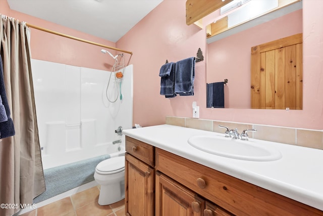 bathroom featuring tile patterned floors, shower / bathtub combination with curtain, vanity, and toilet