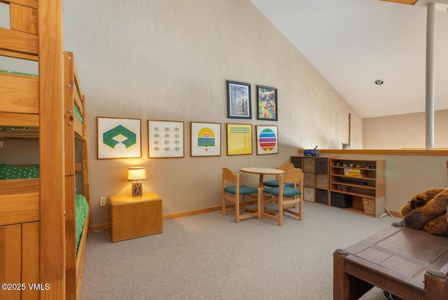 game room with lofted ceiling and carpet flooring