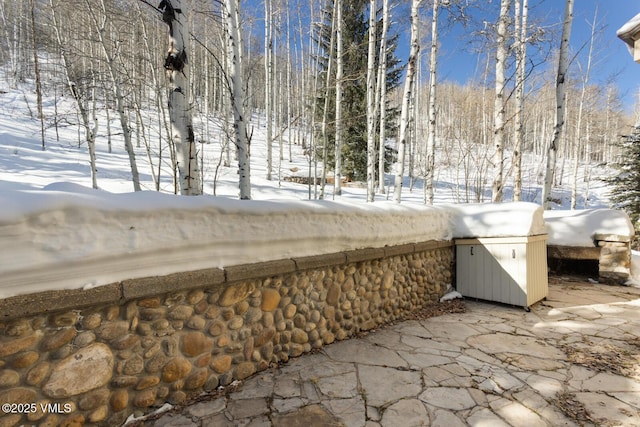 view of snow covered patio