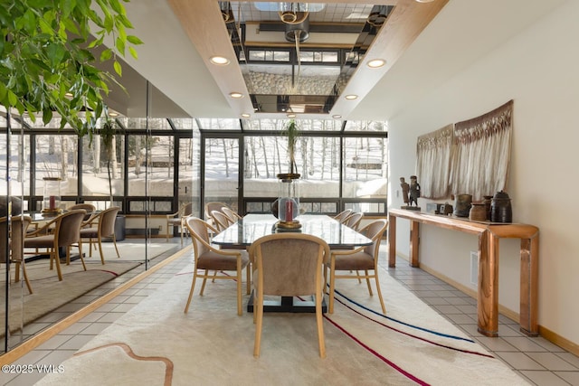 dining space featuring tile patterned flooring