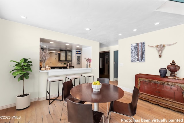4524 Meadow Dr Unit 905, Vail, CO 81657 - dining space featuring hardwood / wood-style floors, recessed lighting, and baseboards