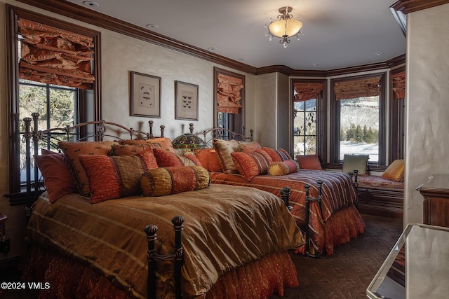 carpeted bedroom with access to exterior and ornamental molding