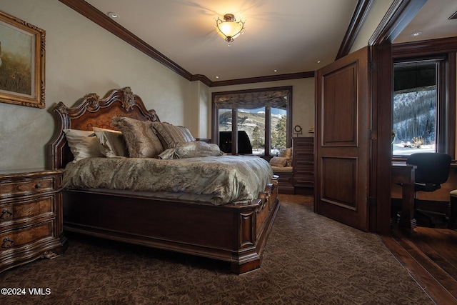 carpeted bedroom featuring crown molding and access to exterior