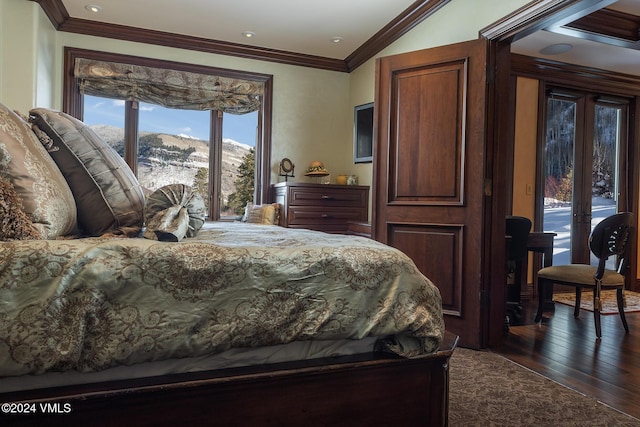 bedroom with french doors, access to outside, ornamental molding, dark hardwood / wood-style flooring, and a mountain view