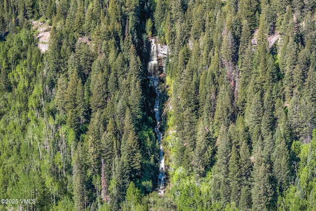 4031 Bighorn Rd Unit 9-H, Vail, CO 81657 - aerial view of property and surrounding area with a heavily wooded area