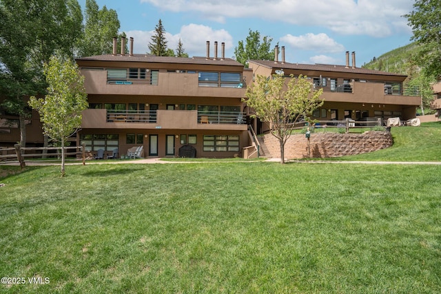 4031 Bighorn Rd Unit 9-H, Vail, CO 81657 - rear view of house featuring stucco siding and a balcony