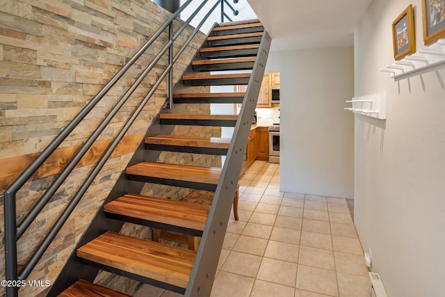 4031 Bighorn Rd Unit 9-H, Vail, CO 81657 - staircase with tile patterned flooring